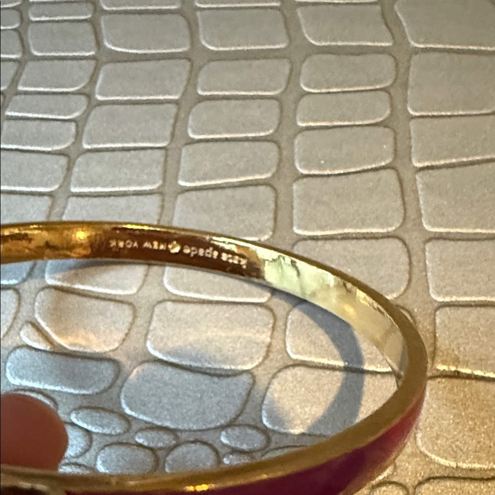 Set of three kate spade Gold, Purple, and Cream Bow Bangle Bracelets - Picture 3 of 6
